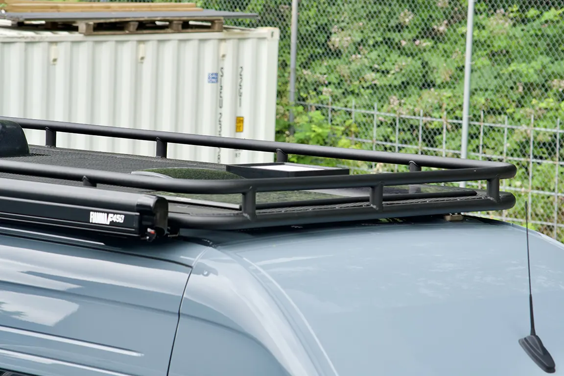 Van roof with roof rack and awning